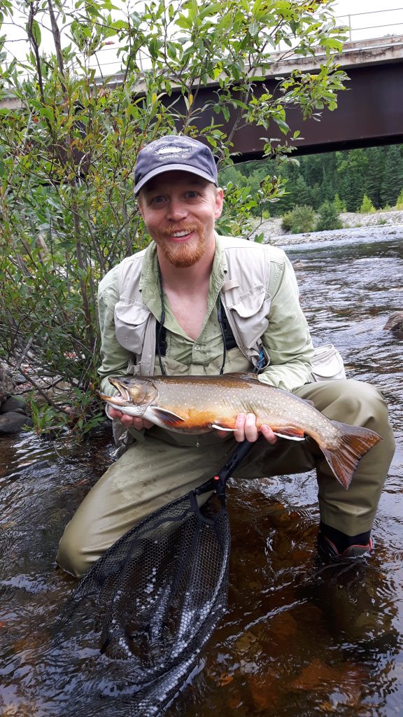 man holding a fish