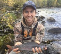 man holding a fish