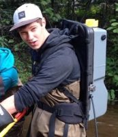 man with an electroshocker backpack