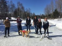 People playing ice hockey on a lake