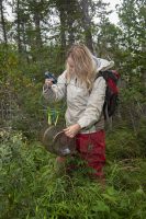 Woman with a minnow trap