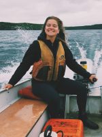 Woman driving a boat