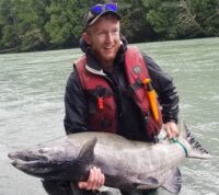 man posing with large fish